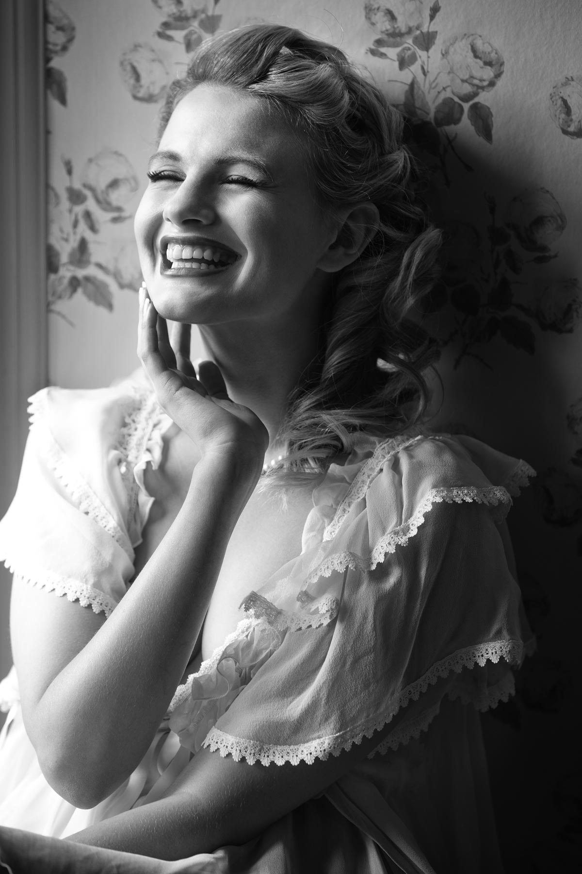 Chloe-Jasmine Whichello laughing by Damien Lovegrove