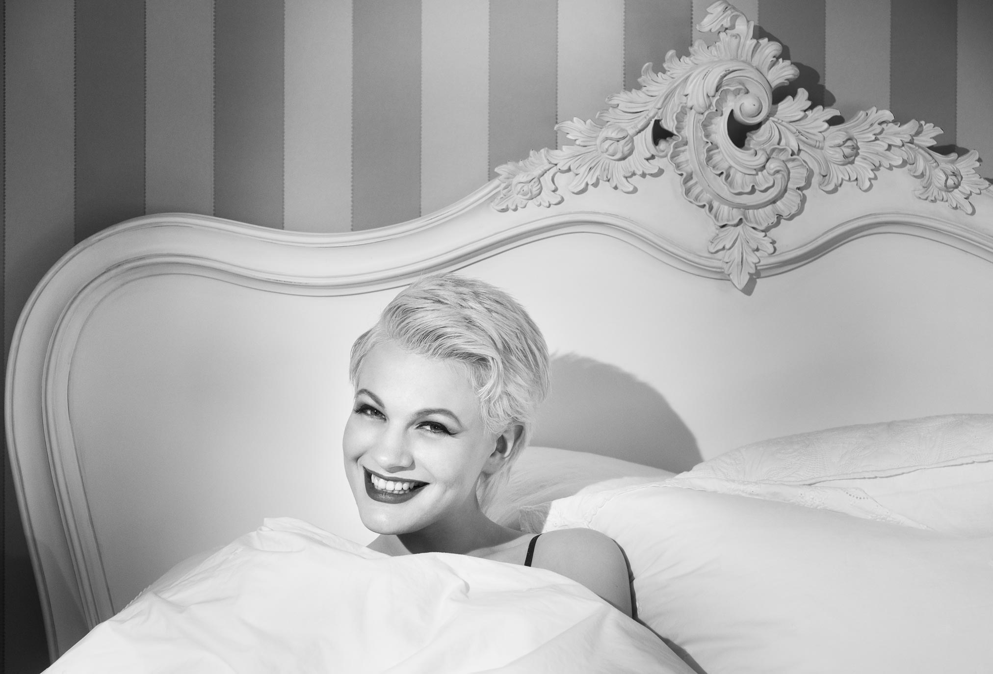 Chloe-Jasmine in bed in the gate cottage at Pipewell Hall, UK